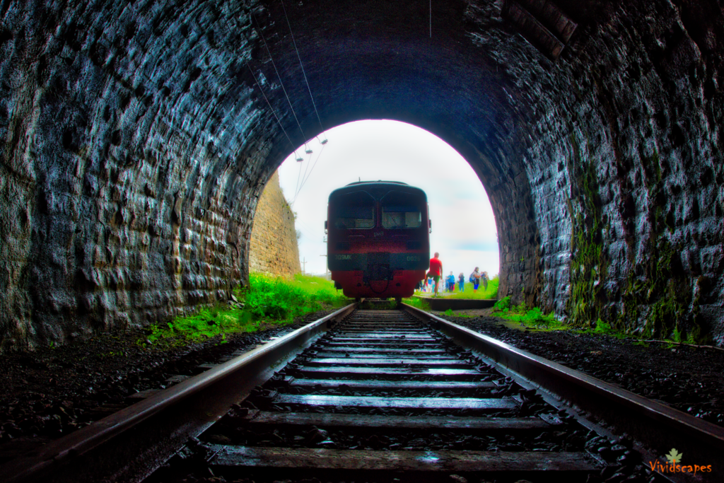 Train chugging along through one of the tunnels.