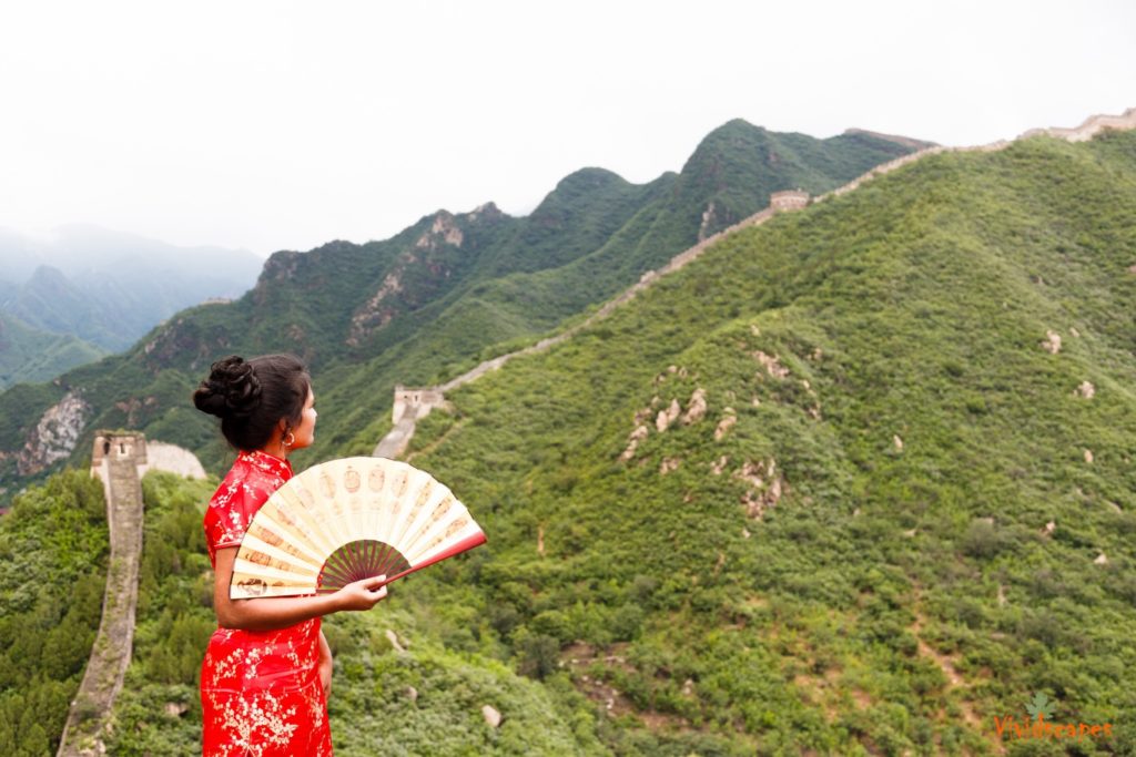 A traditional attire at the Great wall adds to the beauty