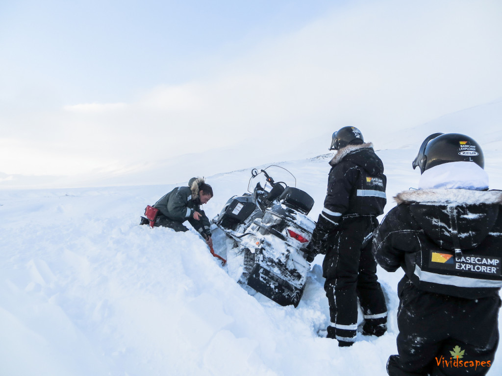 snow mobile stuck in the snow