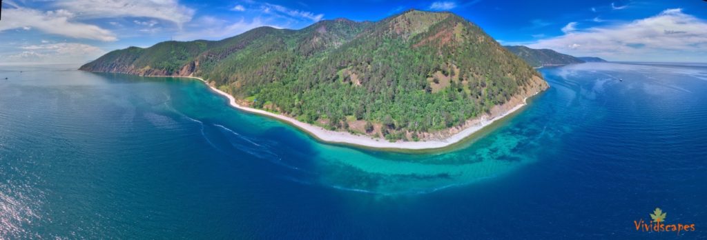 A panoramic view of Lake baikal and the surroundings.